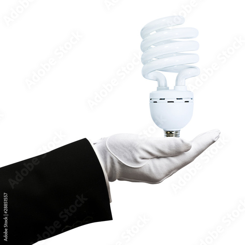 Photo: gloved hand holding light bulb gloved hand holding light bulb