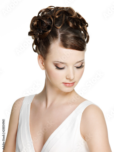 Photo: Woman with beautiful hairstyle and brown make-up Woman with beautiful hairstyle and brown make-up