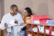 Multiracial office workers working on documents