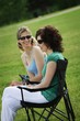 Women Sitting Together
