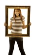 Woman Posing With Picture Frame