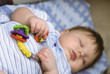 a little boy lying on sofa