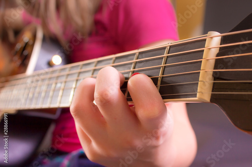 Photo: Girl's Hand on Guitar Girl's Hand on Guitar