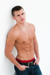 sexy male model topless on a seamless white background sexy male model topless on a seamless white background