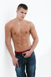 sexy male model topless on a seamless white background sexy male model topless on a seamless white background