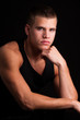 sexy male model wearing a singlet sexy male model wearing a singlet