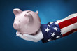 Uncle Sam holding piggy bank