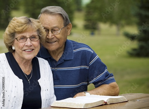 Photo: Senior Couple With Their Bible Senior Couple With Their Bible