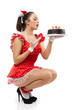 Young beautiful woman with a cake.