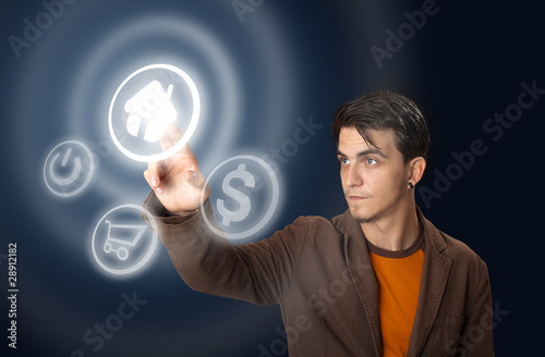 Photo: man pressing a touchscreen button man pressing a touchscreen button