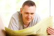 Man reading newspaper
