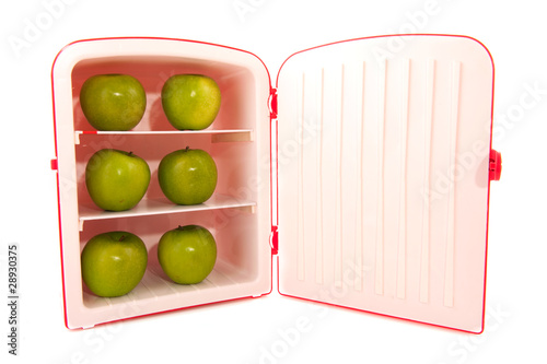Photo: refridgerator with green apples refridgerator with green apples