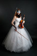Photo: Girl in white dress and mask with violin Girl in white dress and mask with violin