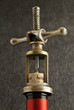 Opening a bottle with an antique corkscrew Opening a bottle with an antique corkscrew