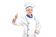 A view of a smiling baker giving thumb up A view of a smiling baker giving thumb up