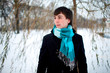 Portrait of young man in winter park