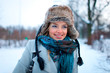 Portrait of beautiful young girl in winter day
