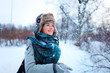 Portrait of beautiful young girl in winter day