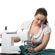 Seamstress work on the sewing-machine Seamstress work on the sewing-machine