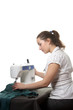 Seamstress work on the sewing-machine Seamstress work on the sewing-machine
