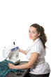 Seamstress work on the sewing-machine Seamstress work on the sewing-machine