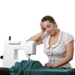 Seamstress work on the sewing-machine Seamstress work on the sewing-machine