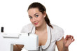 Seamstress work on the sewing-machine Seamstress work on the sewing-machine