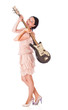 a beautiful young woman is holding the electro guitar