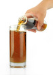 Photo en ligne au meilleur prix Cola pour into glass on white background