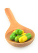 Wooden spoon and pills