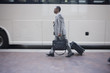 African American businessman heading for a bus