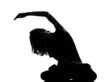 Photo: silhouette woman sitting exercising yoga silhouette woman sitting exercising yoga