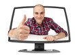 happy young man in the computer monitor happy young man in the computer monitor