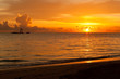 Bright sunrise in early morning with sand beach Bright sunrise in early morning with sand beach