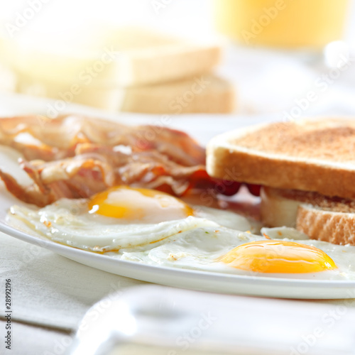 Photo: bacon, eggs and toast breakfast bacon, eggs and toast breakfast