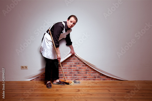 Photo: Sweeping under the carpet Sweeping under the carpet