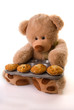 teddy baking muffins