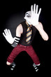 Funny mime in white gloves