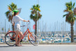 Young girl with a bicycle Young girl with a bicycle