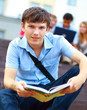 young man read book