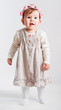 Portrait of the small beautiful girl on a white background