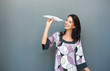 Pretty woman with paper airplane Pretty woman with paper airplane
