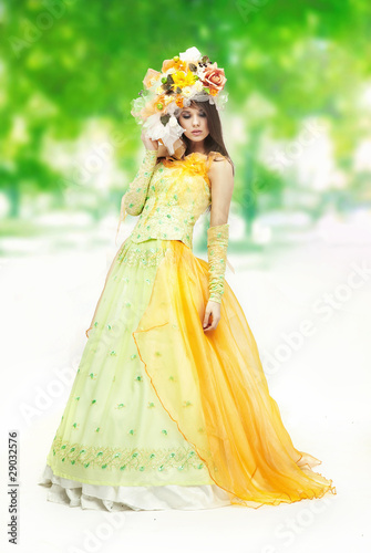 Photo: Young woman on the nature background Young woman on the nature background