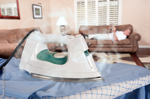 Photo: Man ironing Man ironing