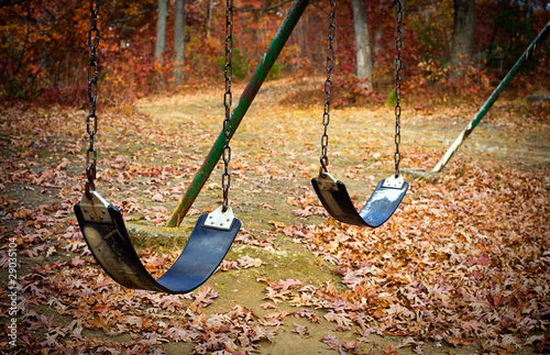 Photo: Old swingset at a park in the fall Old swingset at a park in the fall