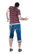 Young man dancing. Rear view. Young man dancing. Rear view.