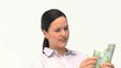 A businesswoman counting her money