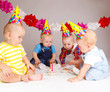 Babies with cupcakes