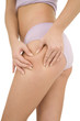 woman controls the cellulite on the thighs