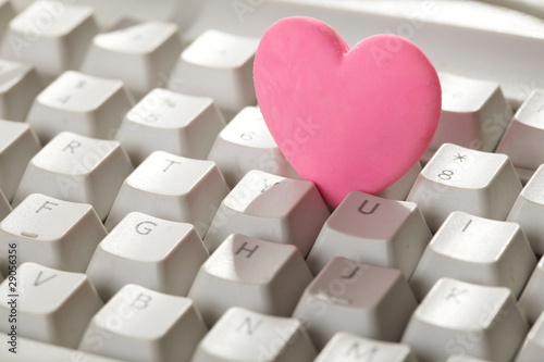Photo: pink heart on the keyboard pink heart on the keyboard